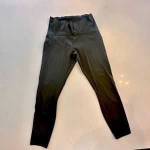 Lululemon dark olive size 8 cropped wonder trains with mesh sides, like new